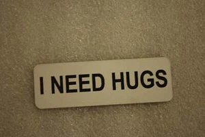 I NEED HUGS (Spaßabzeichen) - Bild 1 von 1