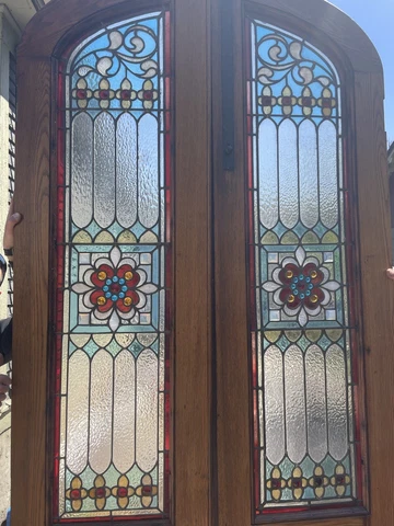 Stunning pair of antique stained glass entry doors- refinished! Cover
