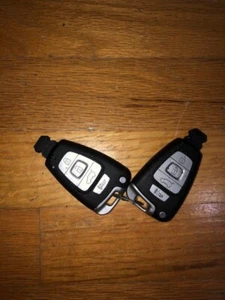 Smart Key pair SY5SVISMKFNA04 2007 - 2012 Hyundai Veracruz - Picture 1 of 3