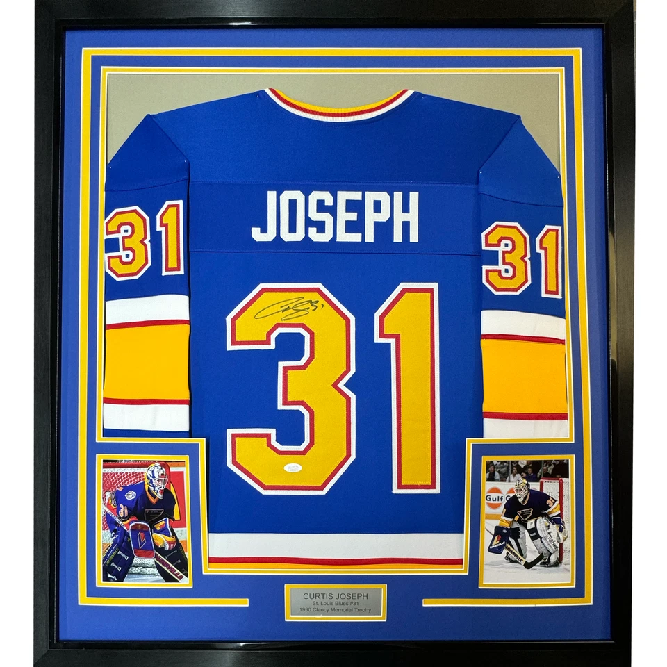 Jersey azul St. Louis 33x42 Curtis Joseph autografiado/firmado enmarcado certificado de autenticidad JSA Foto 1 de 2