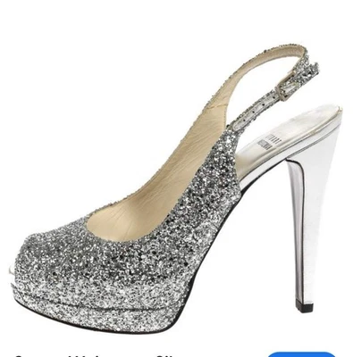 Tacones de plataforma Stuart Weitzman Grace plateados brillantes talla 9 venta al por menor $695 Foto 1 de 4