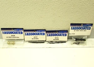 TEAM ASSOCAITED RC18T Front Spring - Gold, Front Shock Body, Screw M2.5x4 & M2x9 - Picture 1 of 2