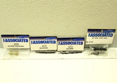 TEAM ASSOCAITED RC18T Front Spring - Gold, Front Shock Body, Screw M2.5x4 & M2x9 - Image 1 of 2