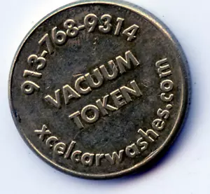 Vacuum & Air: Xcel Vacuum Token - Picture 1 of 2