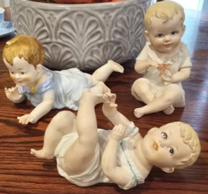 THREE Vtg Bisque Porcelain Piano Babies Japan (66A) - Picture 1 of 8