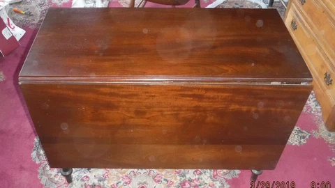 Country Sheraton Drop Leaf Dining Table. Leaves have swingout brackets for suppo Cover