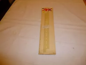 AURORA AFX SLOT CAR GLOW DARK GUARD RAIL SET OF 4 IN ORIGINAL PACKAGE 1970s - Picture 1 of 6