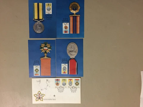 Five MILITARY DECORATIONS fdc.Four are maxi cards Cover