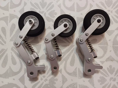 Aluminum Spring Struts & Tires 1 set for RC Model Aircraft/Helicopters - Image 1 of 4