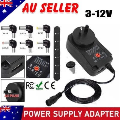 Universal AC/DC 3V-12V Power Supply Adapter Plug-in Wall Charger Adjustable 2.1A - image 1 of 4