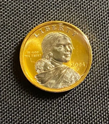 2004 P Sacagawea Platinum & Gold Highlighted $1 Coin  - Image 1 of 4