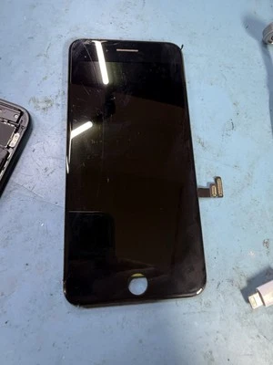 Original OEM iPhone 7 Plus LCD With Hairline Crack And Ear Speaker - Image 1 of 3