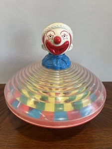 Vintage Clown Head Plunger Spinning Toy Top Plastic - Picture 1 of 4