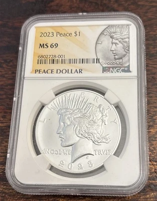 2023 $1 Peace Silver Dollar NGC MS69 - Image 1 of 2