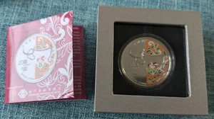 Moneta argento zodiaco bue lunare Macao 2009 1 oz 20 Patacas COA colore Cina - Foto 1 di 8