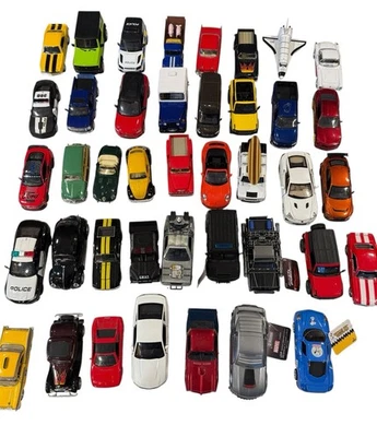 Lot of 39 Diecast Cars Kinsmart Jada Toys Mixed Scale Police Exotic Trucks - Image 1 of 4