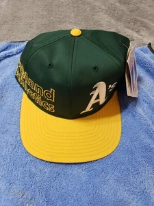 VINTAGE DEADSTOCK OAKLAND ATHLETICS LOGO 7 DRUCKKNOPFLASCHE MÜTZE/KAPPE EXTREM SELTEN... - Bild 1 von 9