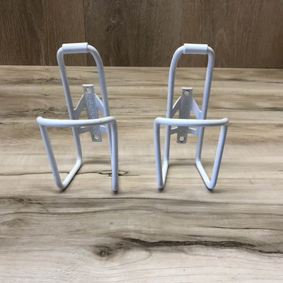 Lote de (2) jaulas vintage de aluminio blanco SUPERBYKE EE. UU. para botellas de agua Foto 1 de 4