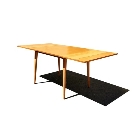A mid-century modern Paul McCobb planner group dining table Cover