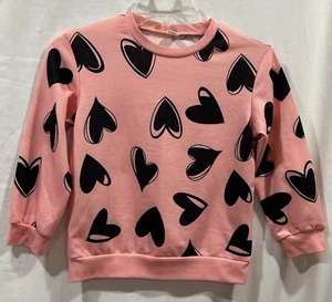 SHEIN Girls Long Sleeve Coral Pink Sweatshirt All Over Black Heart Print Size 7Y - Picture 1 of 8