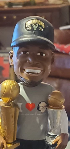 Giannis Antetokounmpo SGA Bobble With The Larry O’Brien And Finals MVP Trophy Cover