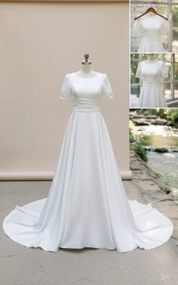 Enchanting Handmade Wedding Dress – Ball Gown with Flowing Train & ¾ Sleeves - Image 1 of 4