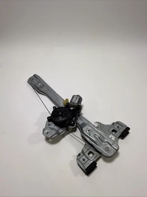 Cadillac ATS 2013-2018 regulador de ventana lateral trasero izquierdo con motor OEM Foto 1 de 4