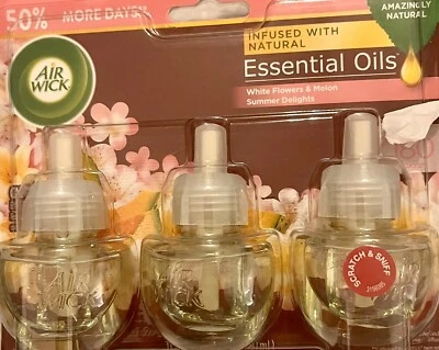 Paquete de 3 aceites esenciales Air Wick flores blancas y melón delicias de verano nuevos Foto 1 de 2