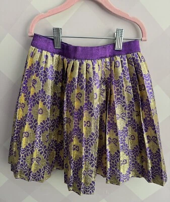 Gucci FALDA DORADA Y MORADA PARA NIÑA CON DOBLE GG Talla 10 Foto 1 de 4