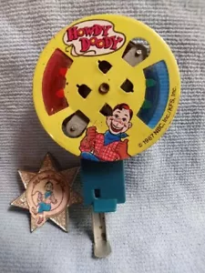 Howdy Doody 1980's toy set, Sheriff Badge and tin Litho hand push and spin - Picture 1 of 3
