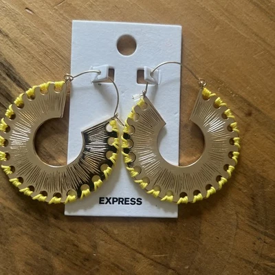 Pendientes colgantes Express oro y amarillo Foto 1 de 2