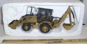 NZG CONRAD CASE 580 SUPER K LOADER BACK HOE 1:35 IN GOLD - Picture 1 of 5