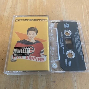 RAGE AGAINST THE MACHINE - EVIL EMPIRE (EPIC ET57523) 1996 USA CASSETTE TAPE - Picture 1 of 3