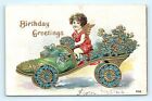 Postcard Happy Birthday Greetings Cherub Driving Flower Shoe Car c1916 B39