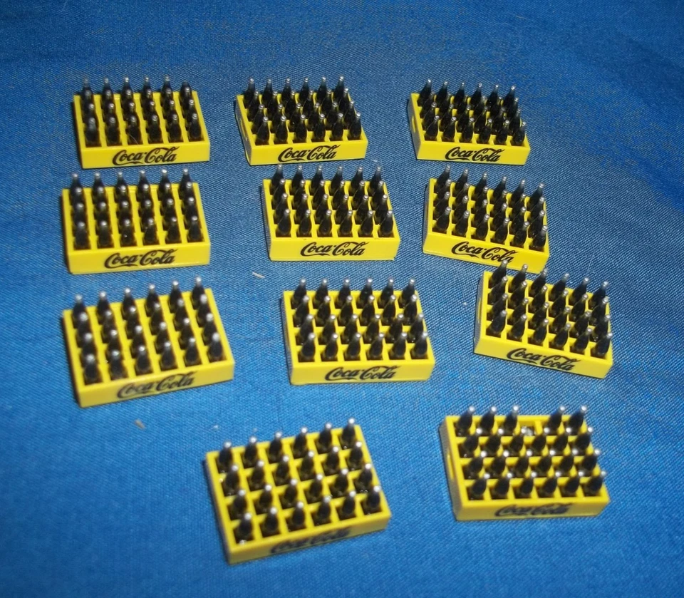 Lot of 11 Mini Coca Cola Crates with 24 Bottles Coca Cola in Blue - Image 1 of 2