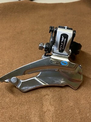 SHIMANO ALTUS FD-M311 FRONT DERAILLEUR MECH MTB CLAMP 31.8 34.9 90S VINTAGE - Imagen 1 de 4