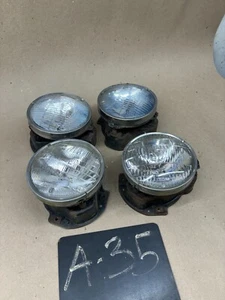 1964 65 OLDSMOBILE CUTLASS SUPREME F85 VISTA CRUISER HEADLIGHT MOUNT BUCKETS SET - Picture 1 of 21