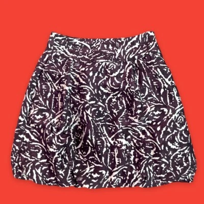 REPÚBLICA BANANERA... Falda de seda forrada con volantes hinchados... marrón blanco... Talla 4 Foto 1 de 4