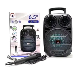 KARAOKE CASSA PORTATILE BLUETOOTH CON MICROFONO USB MICRO SD MP3 FM - Foto 1 di 1