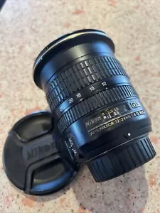 Nikon AF-S NIKKOR 12-24 mm f/4 G ED DX Made in Japan - Foto 1 di 7
