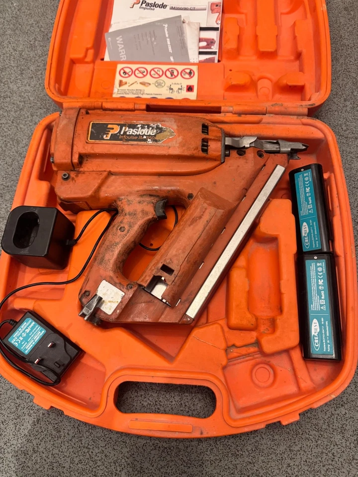 PASLODE IM350 1ST FIX NAIL GUN   (SERVICED)+ 2 BATTERIES+CHARGER+ORIGINAL BOX  - Image 1 of 4