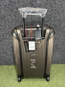 Tumi Vapor 22” International Carry-On Hardcase Spinner Luggage Gold Carbon $675 - Picture 1 of 13