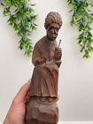 Hand carved antique wood mill man piece is a beautiful piece of furniture