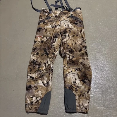 SITKA DELTA GORE-TEX BIBS OPTIFADE WATERFOWL MARSH MENS X-LARGE - Image 1 of 4