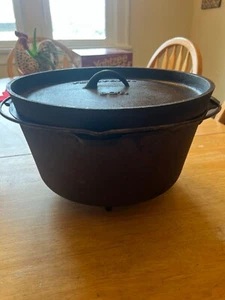 Texsport Gusseisen Drahtgriff offenes Feuer Dutch Oven mit Beinen & Deckel - 8 Quart. Sehr guter Zustand - Bild 1 von 6