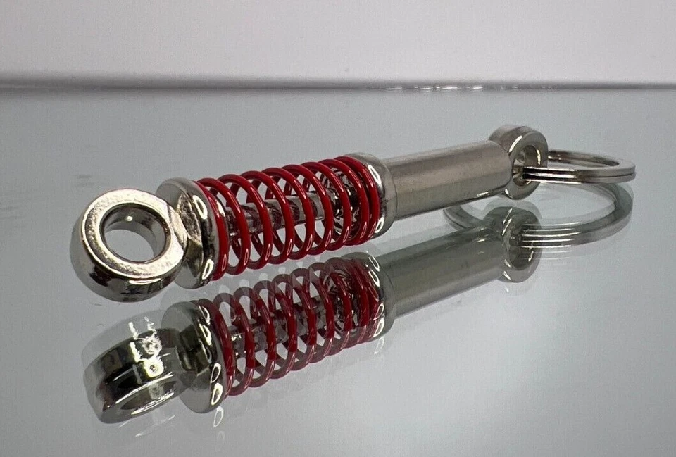 Car Shocks/Shock Absorber (shrinks in size when squeezed) Keychain - Image 1 of 1