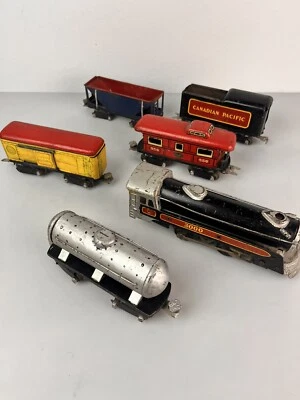 Marx Electric Steam Locomotive 3000 & 5 Tin Cars - Image 1 of 4
