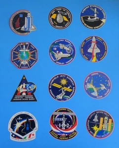 Lote de 12 logotipos del programa de parches del transbordador espacial STS 80 a 103 de la misión de la NASA - Imagen 1 de 6