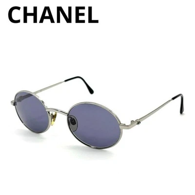 Gafas de sol CHANEL ovaladas con marco de metal plateado marca de coco lentes negras 06934 Foto 1 de 4