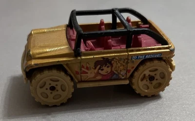 2002 MATCHBOX JEEP WILLYS CONCEPT GO DIEGO GO GOLD 1:59 DIECAST 2 3/8" CAR W RED - Image 1 of 4